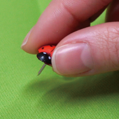 Pin‑friendly surface